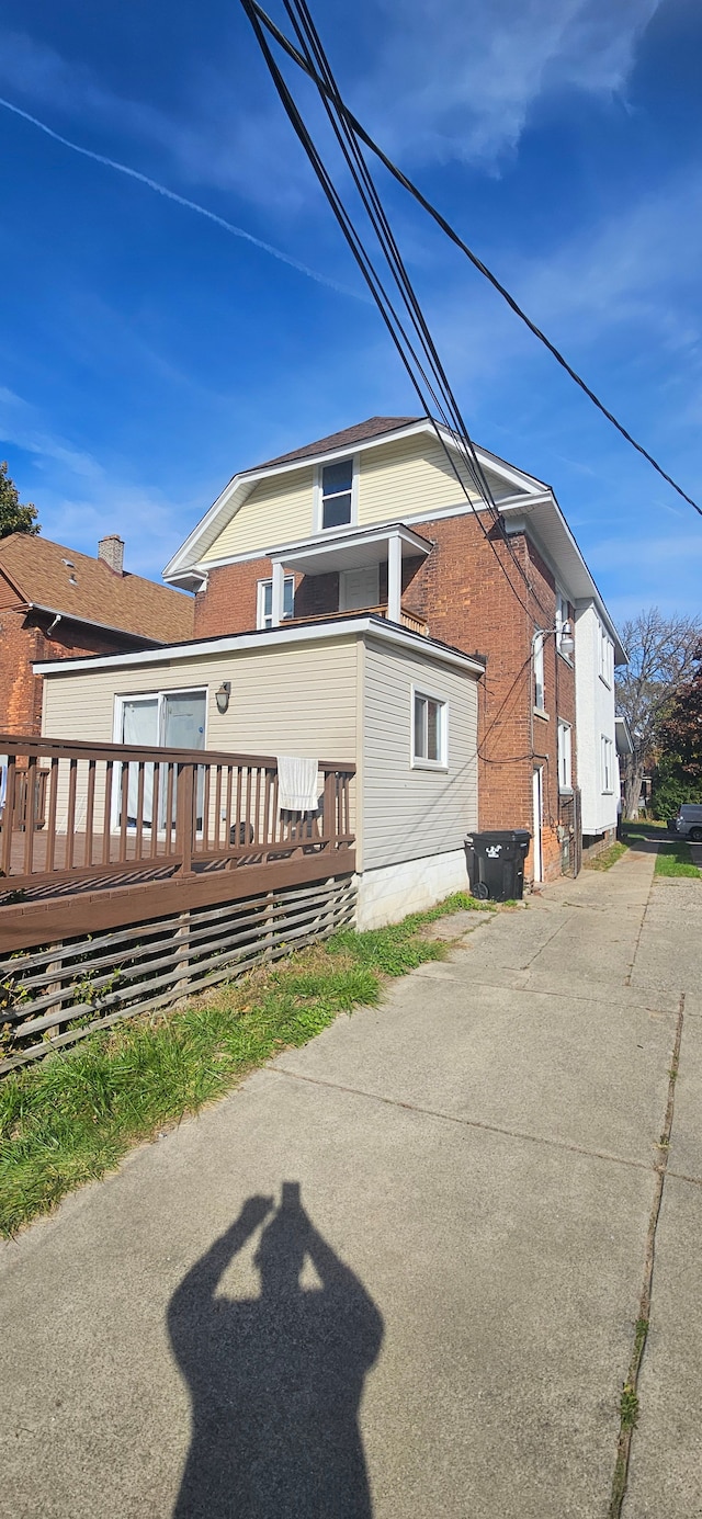 3937 Beniteau St, Detroit, MI 48214 - view of side of home featuring a deck