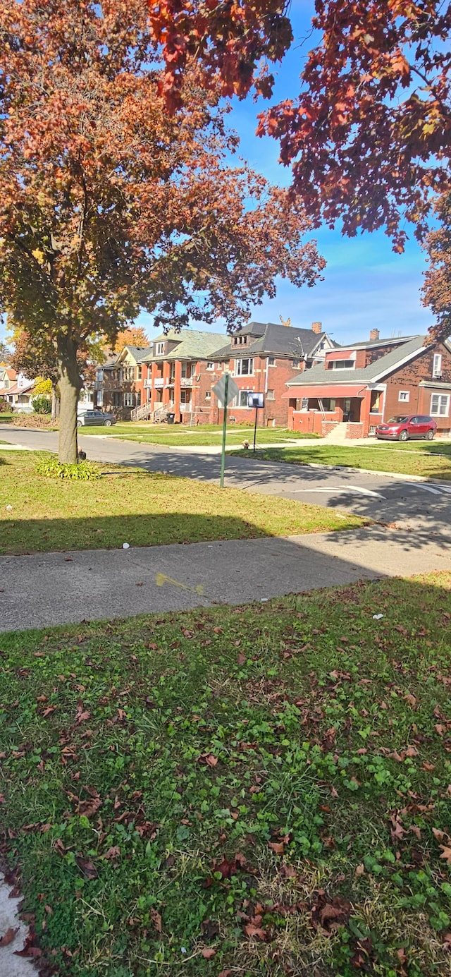 3937 Beniteau St, Detroit, MI 48214 - view of grassy yard with a residential view