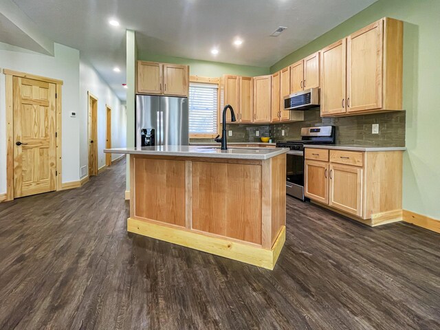 620 S Main St, Wayland, MI 49348 - kitchen with stainless steel appliances, light brown cabinetry, baseboards, dark wood-type flooring, and recessed lighting