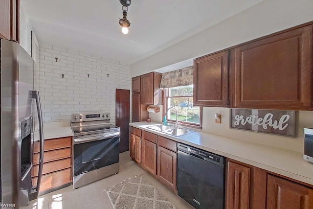 kitchen featuring decorative backsplash, sink, and stainless steel appliances