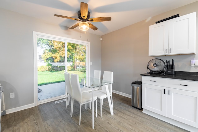 dining area featuring ceiling fan and light hardwood / wood-style floors