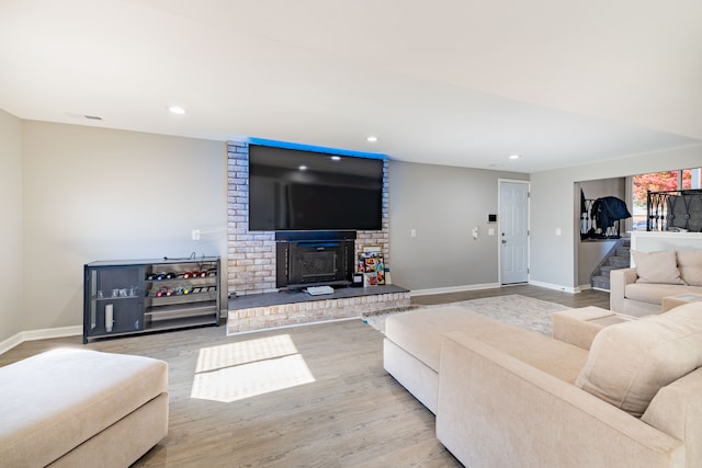 living room with light hardwood / wood-style flooring