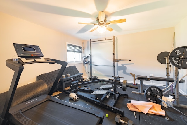 exercise room with ceiling fan