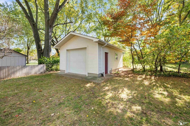 garage with a yard