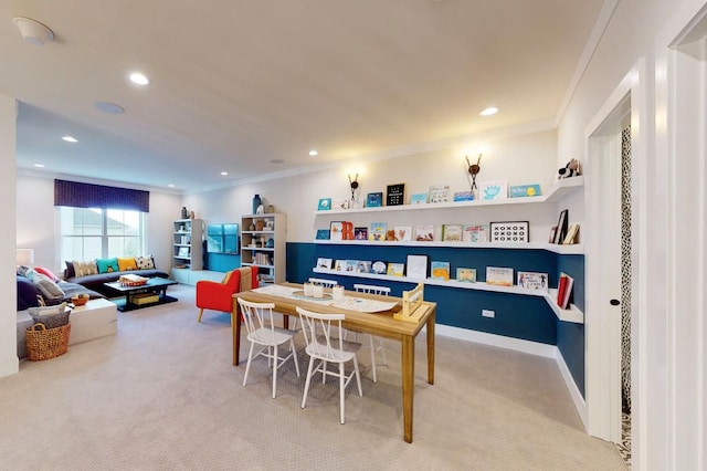 playroom featuring carpet and ornamental molding