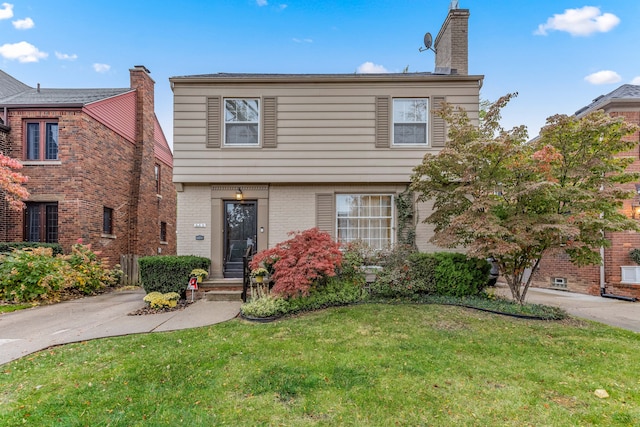 view of front of property featuring a front lawn