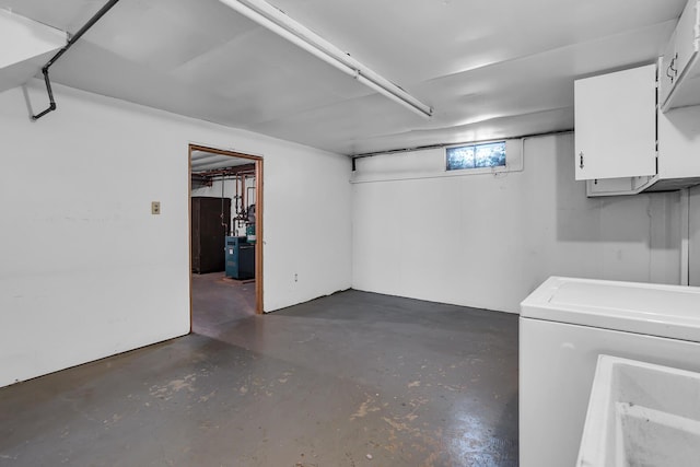 basement with washer / dryer