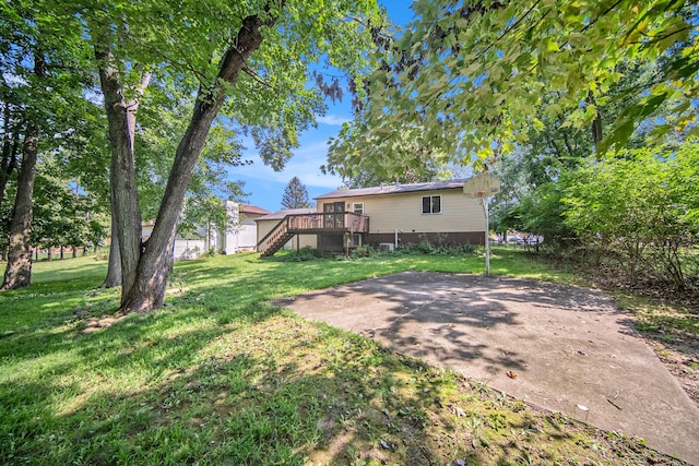 view of yard with a deck