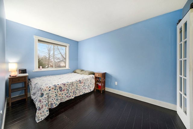 bedroom featuring hardwood / wood-style flooring