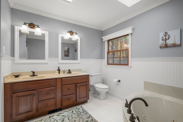 bathroom with vanity, a tub to relax in, toilet, and ornamental molding