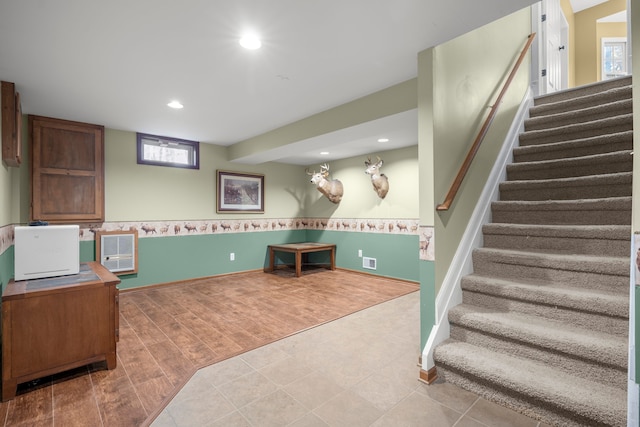 playroom with light hardwood / wood-style floors