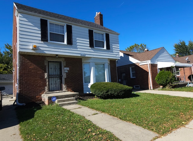 view of front facade with a front yard