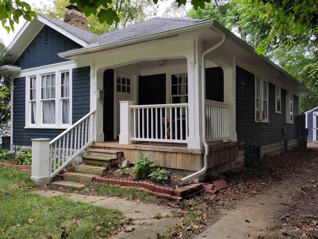 bungalow-style home featuring a porch