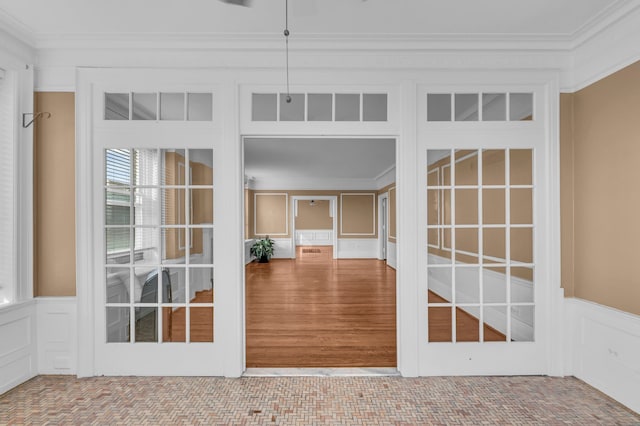 unfurnished sunroom with french doors