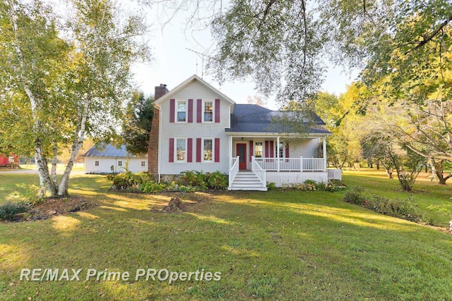 10300 Lange Rd, Birch Run, MI 48415 - view of front of property featuring covered porch, a front yard, and a chimney