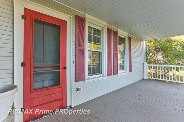 10300 Lange Rd, Birch Run, MI 48415 - doorway to property with covered porch