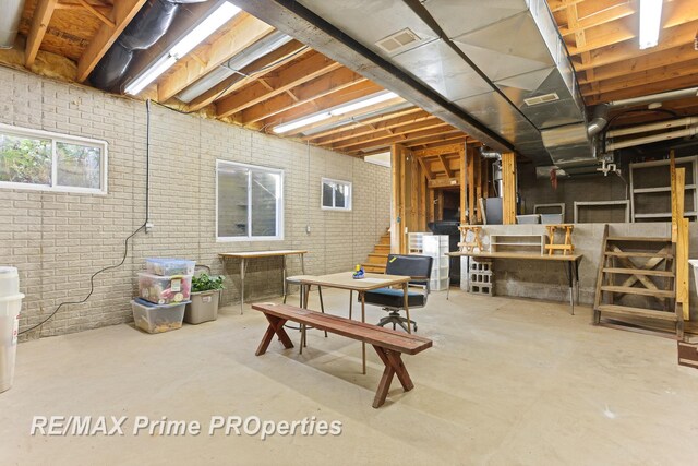 10300 Lange Rd, Birch Run, MI 48415 - below grade area featuring brick wall