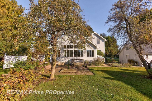 10300 Lange Rd, Birch Run, MI 48415 - back of property featuring a yard