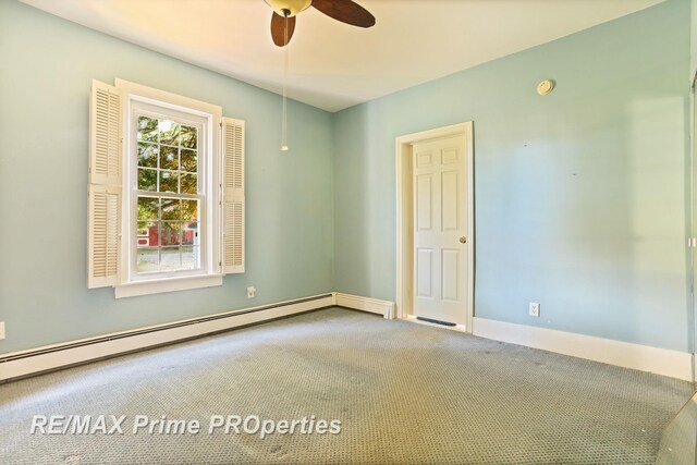 10300 Lange Rd, Birch Run, MI 48415 - carpeted spare room with ceiling fan and baseboard heating