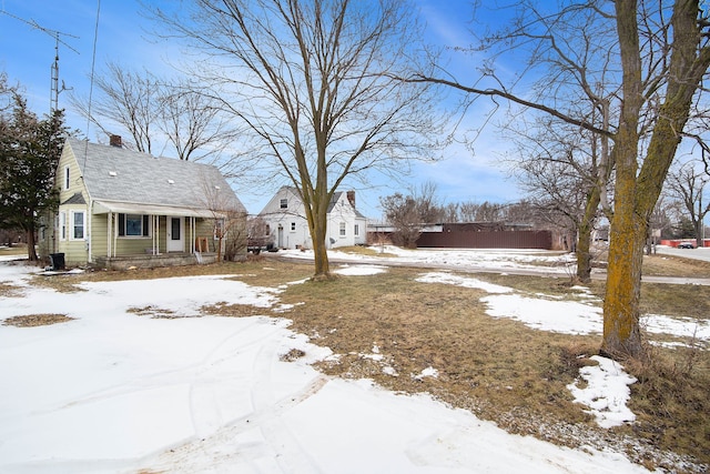 view of yard covered in snow