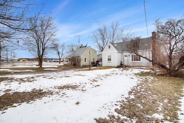 view of snow covered property