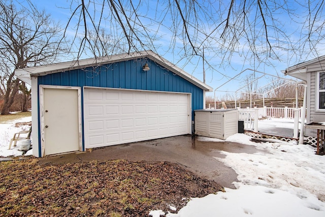 view of snow covered garage