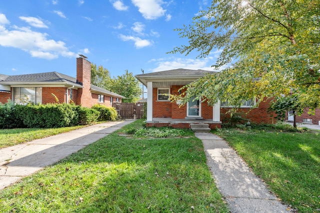 view of front of home with a front yard