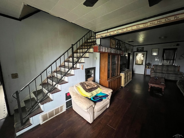 stairway with hardwood / wood-style flooring