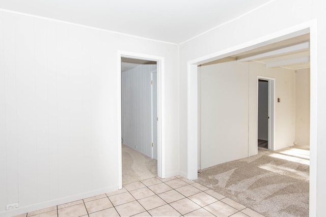 empty room with light colored carpet