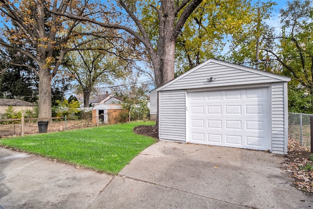 garage with a lawn