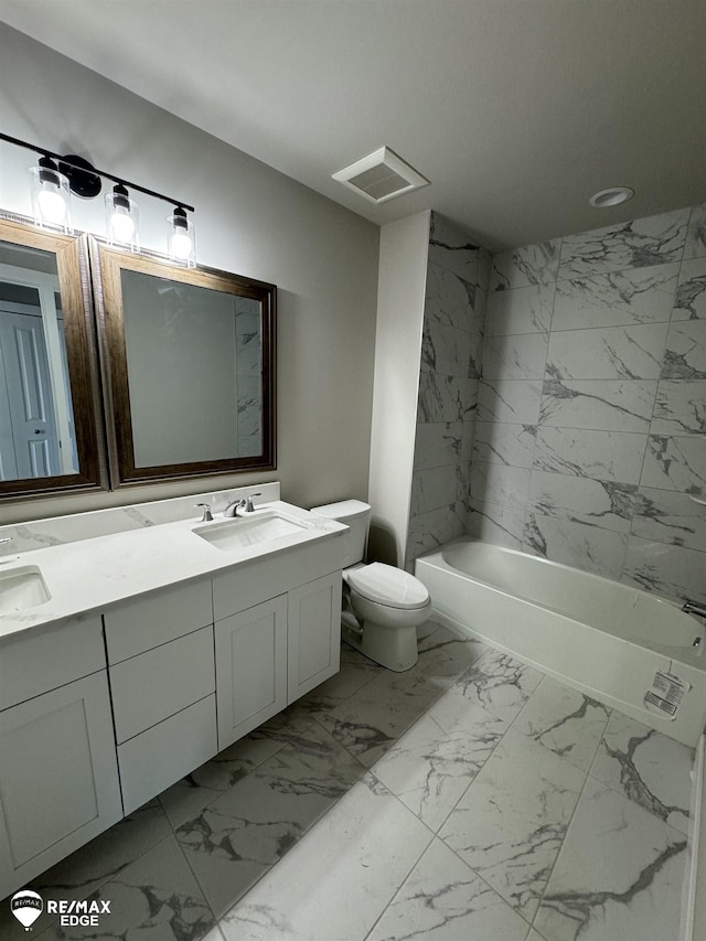 bathroom with toilet, marble finish floor, visible vents, and a sink