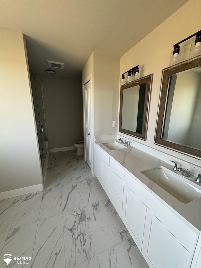 full bathroom featuring marble finish floor, visible vents, a sink, and toilet