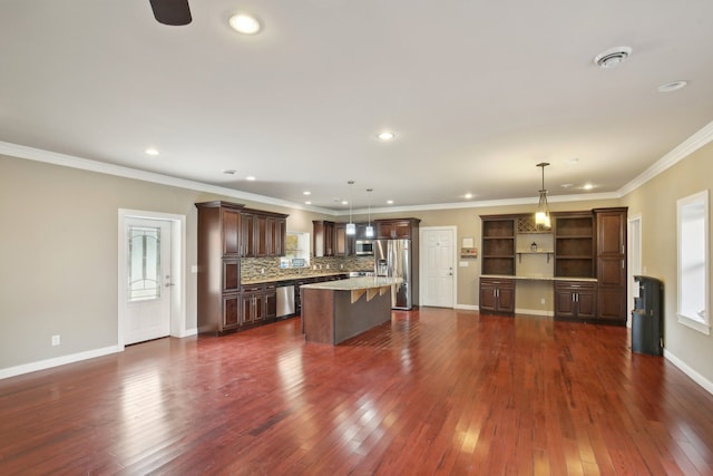 kitchen featuring decorative backsplash, a breakfast bar, dark wood-style floors, and stainless steel appliances