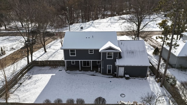 view of snow covered property