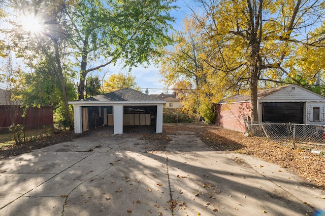 garage featuring a carport