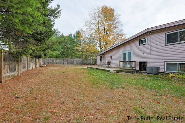 view of yard with central AC