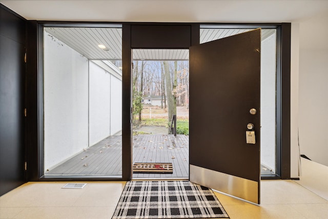 entrance foyer with floor to ceiling windows