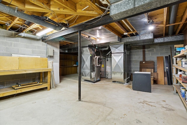 basement with heating unit and water heater