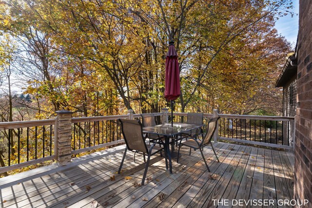 2766 48th Ave, Zeeland, MI 49464 - wooden deck with outdoor dining area