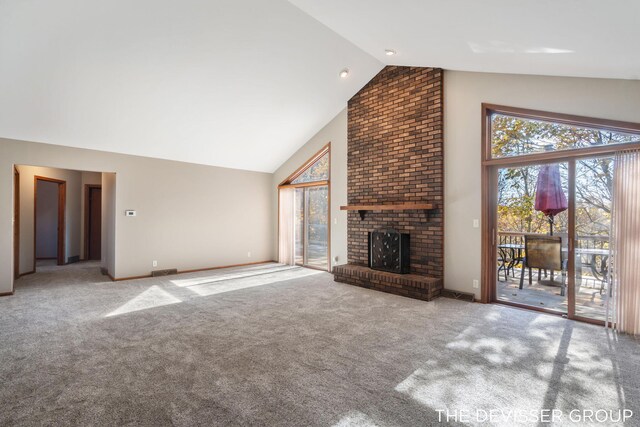2766 48th Ave, Zeeland, MI 49464 - unfurnished living room with high vaulted ceiling, carpet, a fireplace, and baseboards