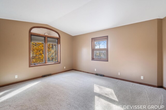 2766 48th Ave, Zeeland, MI 49464 - carpeted spare room with lofted ceiling and baseboards