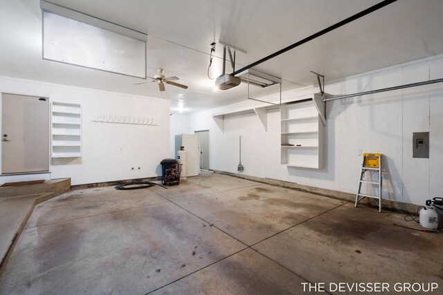2766 48th Ave, Zeeland, MI 49464 - garage featuring a garage door opener, electric panel, and a ceiling fan