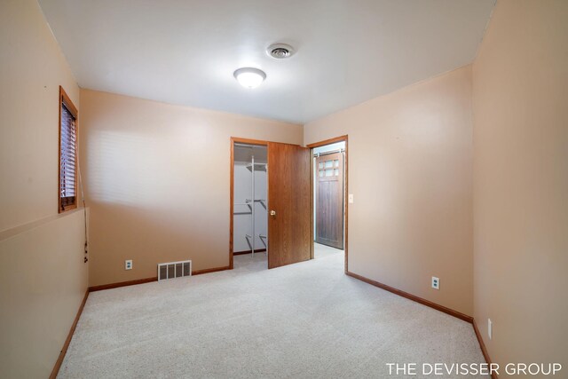 2766 48th Ave, Zeeland, MI 49464 - spare room featuring baseboards and carpet