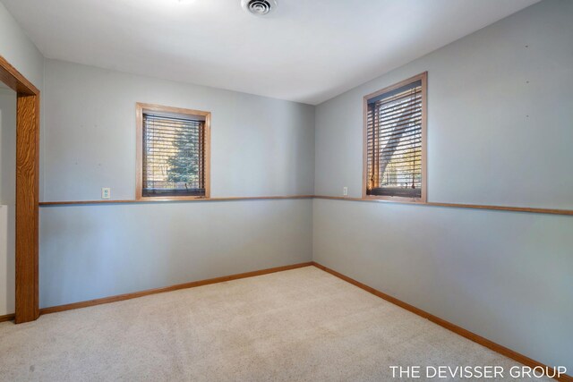 2766 48th Ave, Zeeland, MI 49464 - carpeted spare room with baseboards
