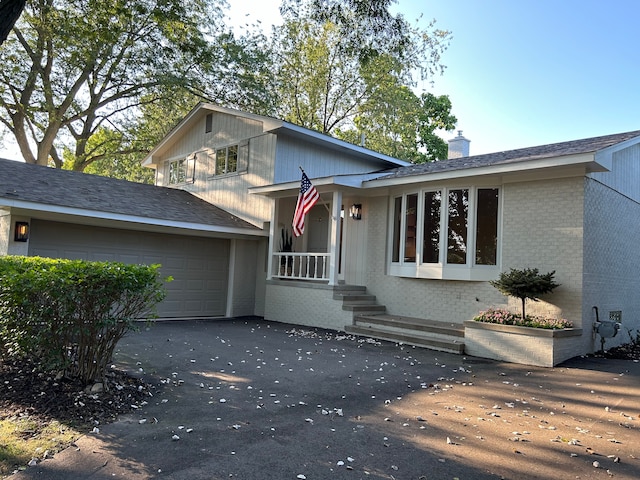 tri-level home featuring a garage