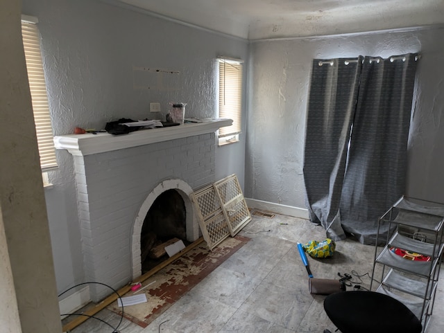 unfurnished living room with a fireplace