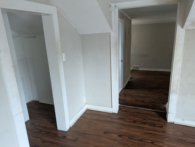 hall with dark hardwood / wood-style flooring