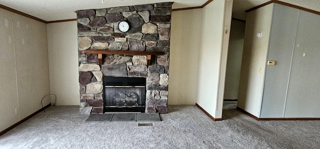 room details with a fireplace, a textured ceiling, carpet floors, and crown molding