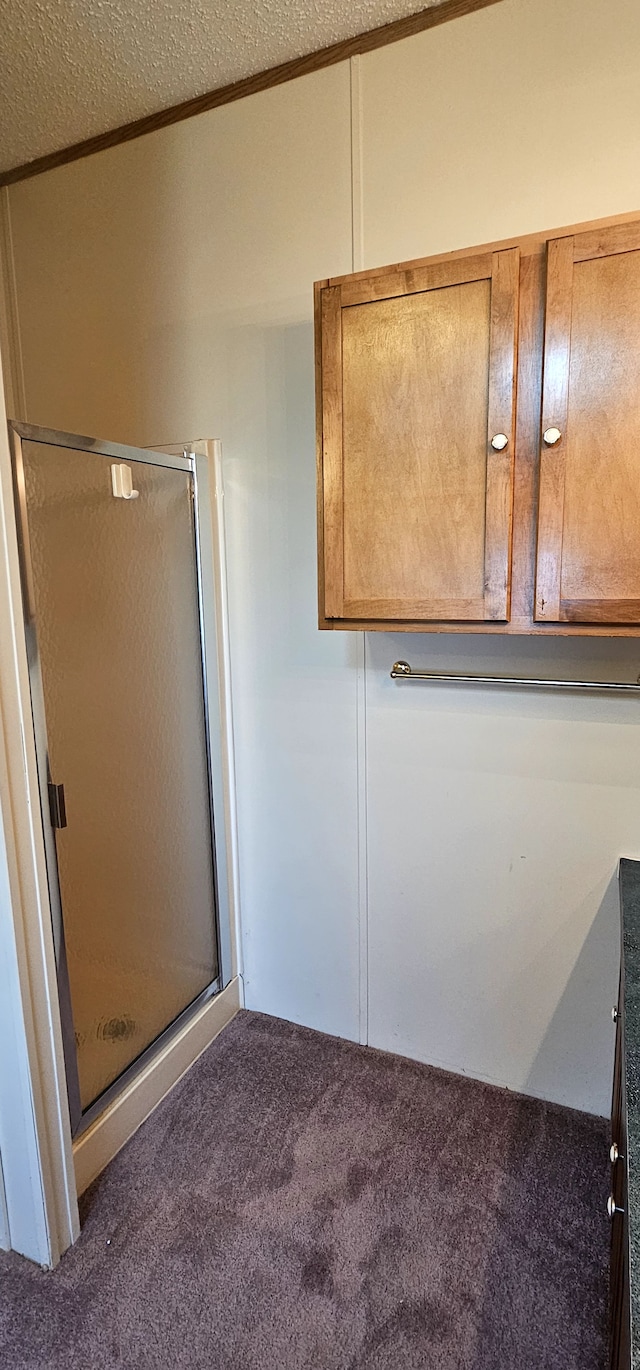 bathroom featuring a textured ceiling