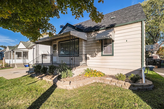 bungalow with a front yard